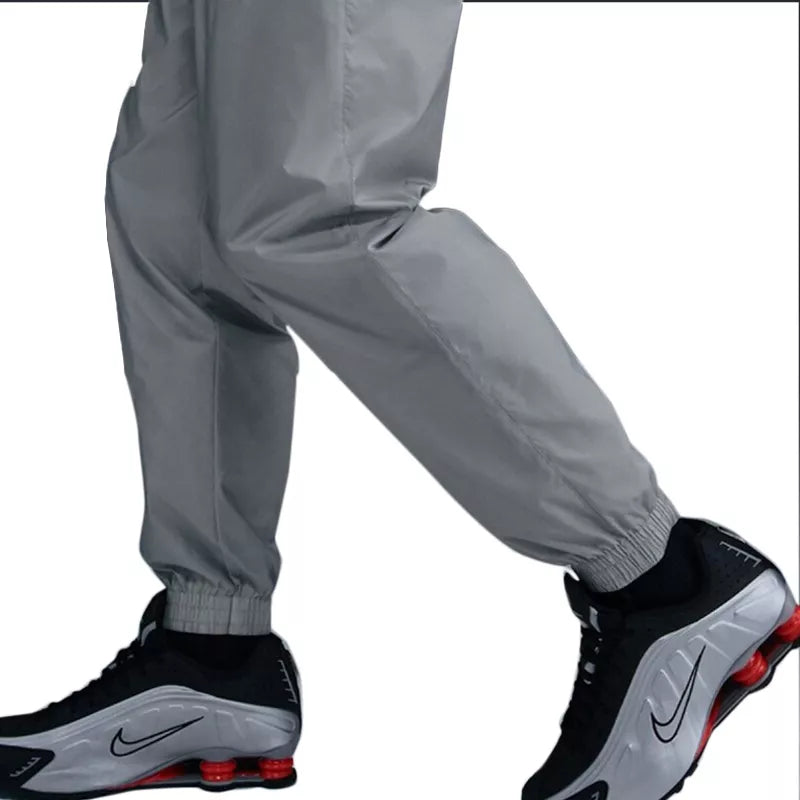 Ensemble de survêtement Nike CLUB WOVEN