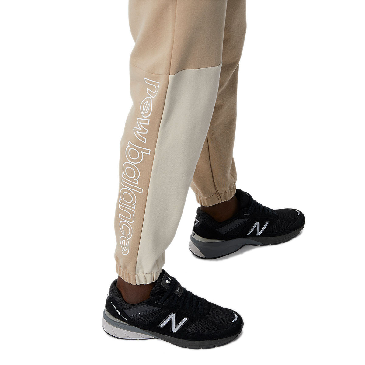 Pantalon de survêtement New Balance ATHLETICS RENEW