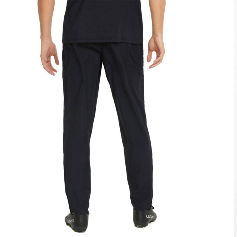 Pantalon de survêtement Puma MANCHESTER CITY FC PREMATCH WOVEN