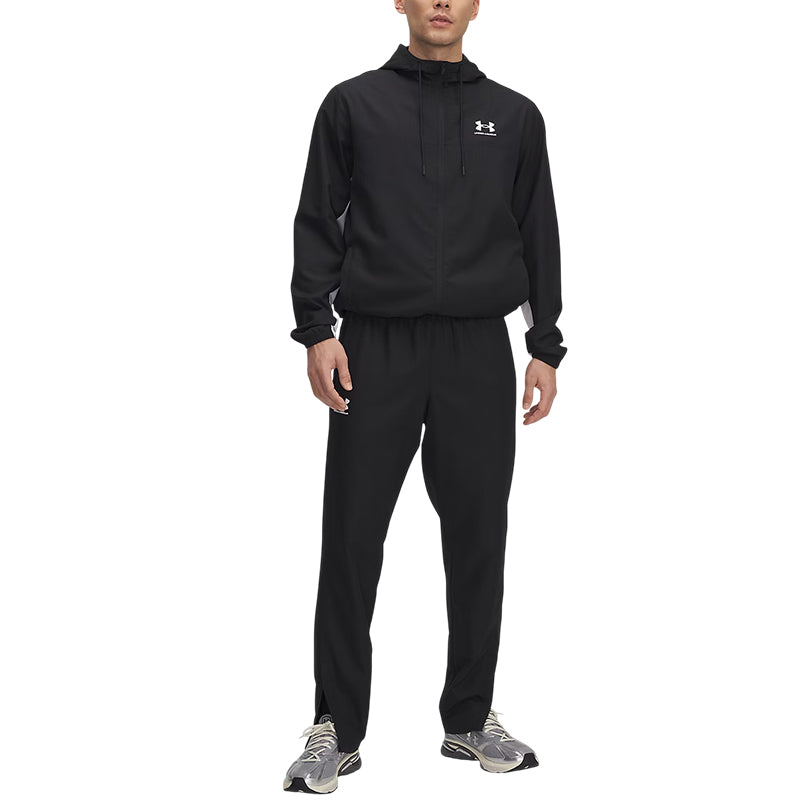 Pantalones cortavientos tejidos Under Armour RIVAL
