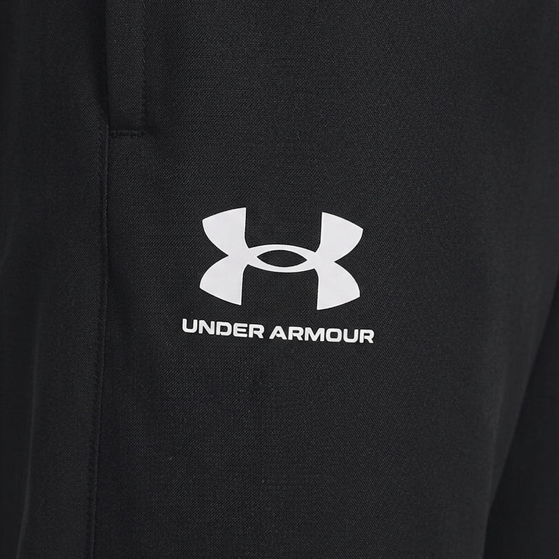 Pantalones cortavientos tejidos Under Armour RIVAL