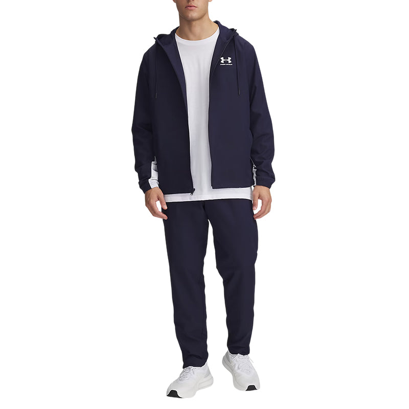 Pantalones cortavientos tejidos Under Armour RIVAL