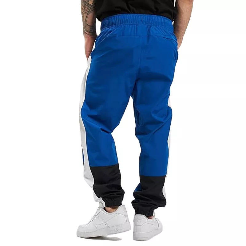 Pantalón de chándal para hombre New Balance NB ATHLETICS WINDBREAKER