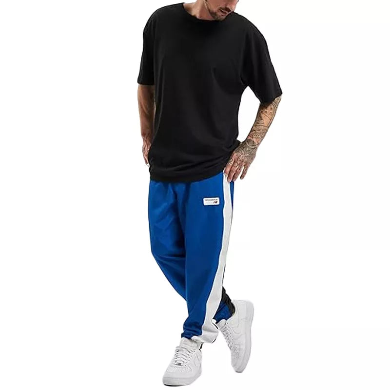 Pantalón de chándal para hombre New Balance NB ATHLETICS WINDBREAKER