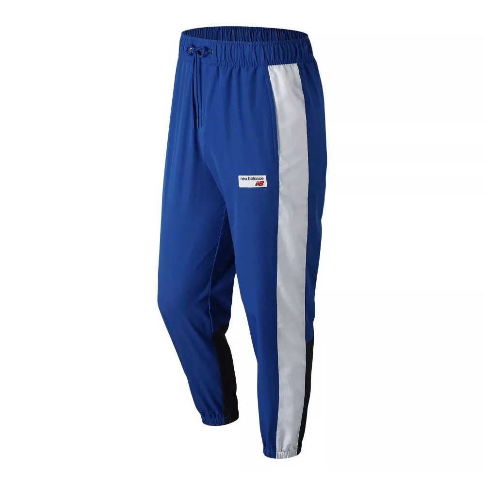 Pantalon de survêtement New Balance NB ATHLETICS WINDBREAKE - Ref. MP91507-5