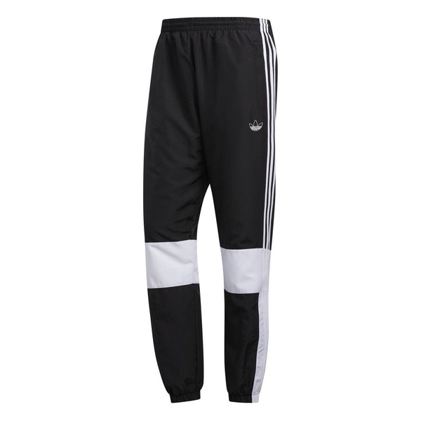 Pantalones deportivos ASYMM de adidas Originals