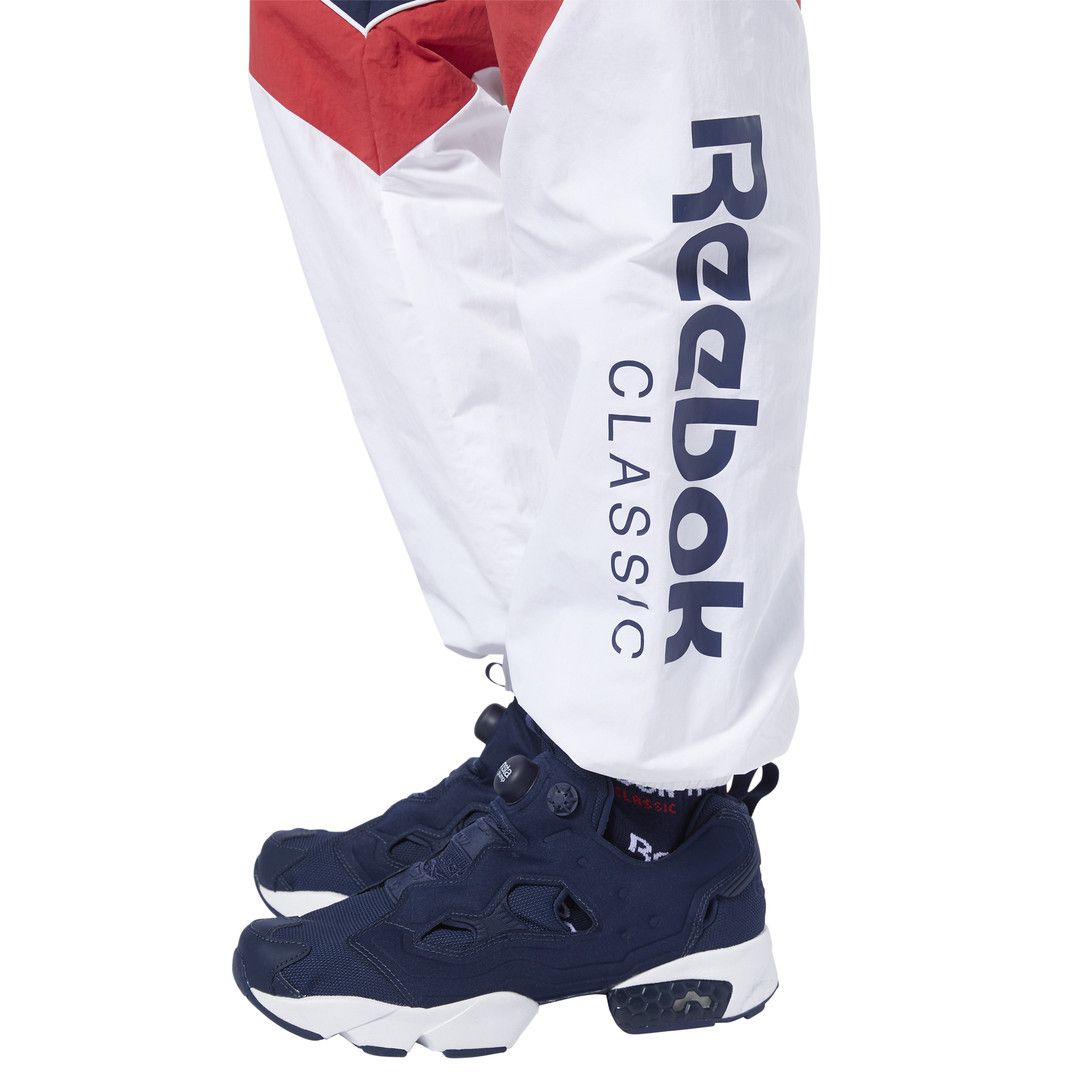 Pantalons de survêtement Reebok AC GR IMPRIME PANT